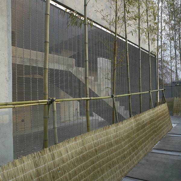 Argger architectural mesh acts as courtyard security barrier.