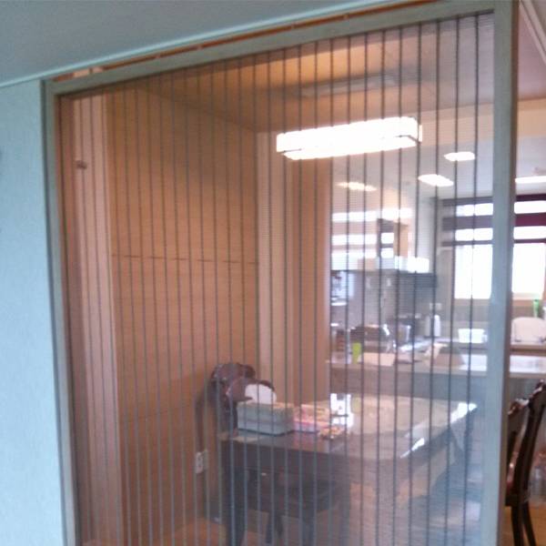 Argger architectural mesh works as kitchen partitions.