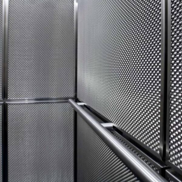 Argger architectural mesh for shopping center elevator cab.