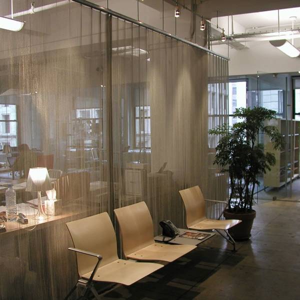 Argger architectural mesh acts as office partitions.