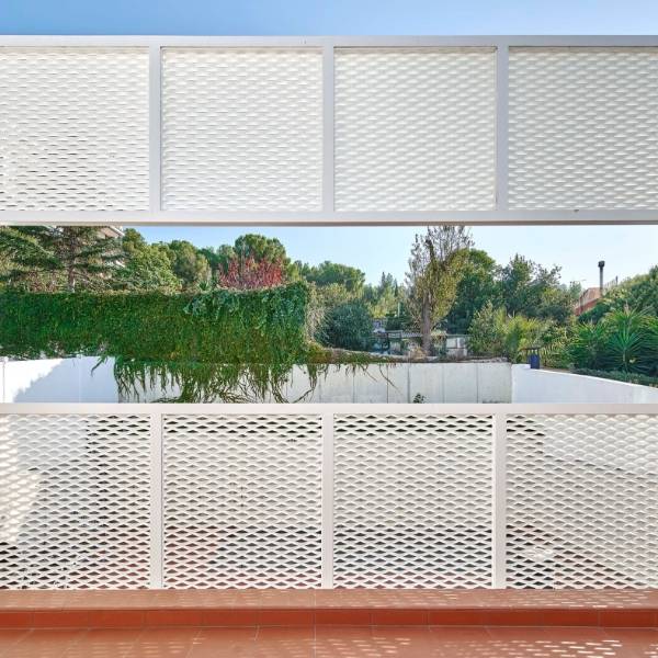 Argger architectural mesh serves as residential security barrier.