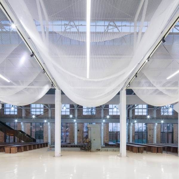 Argger architectural mesh acts as shopping center ceiling.