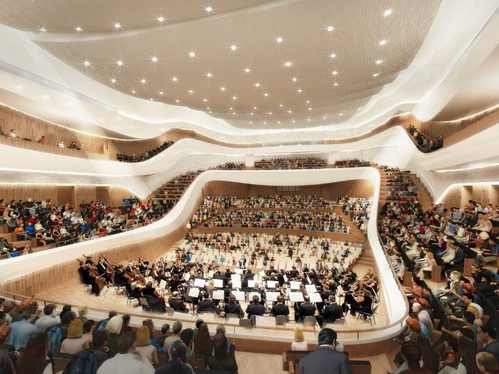 Le public apprécie la musique jouée dans la salle de concert