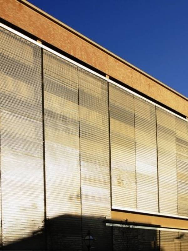 Argger architectural mesh is used as parking screen in shopping mall parking lots.