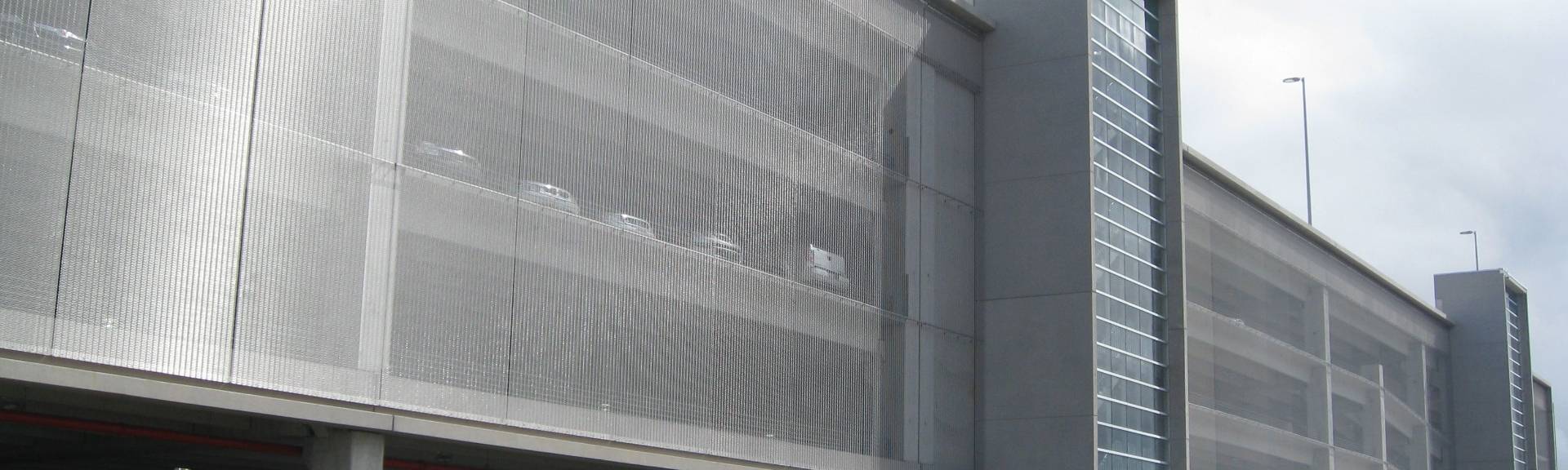 Argger architectural mesh is used as parking screen.