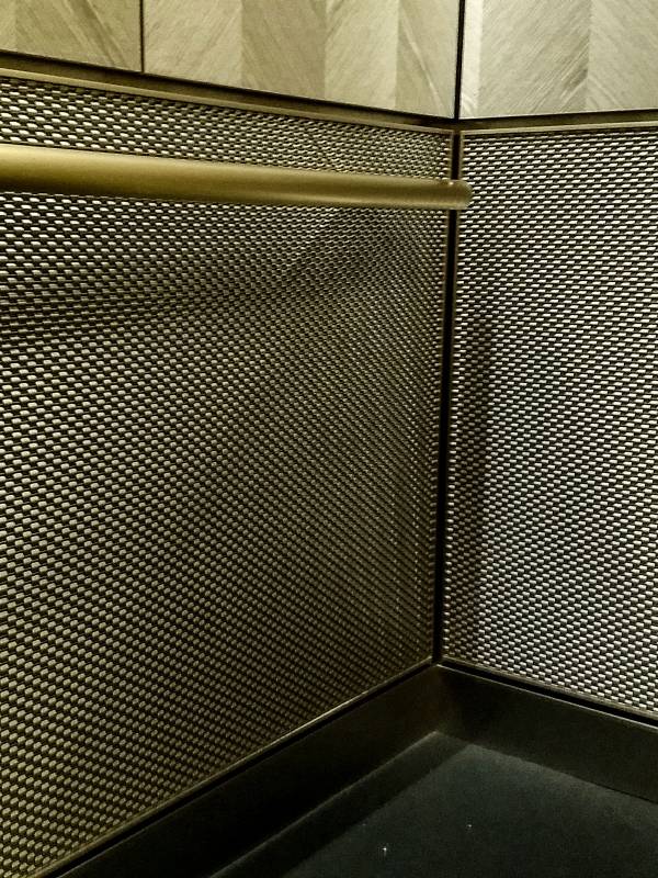Commercial building covered with Argger decorative mesh elevator cab