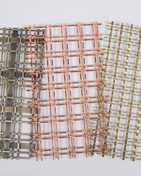 Several architectural mesh samples on the table.