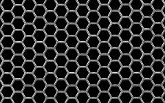 Una muestra de metal perforado hexagonal