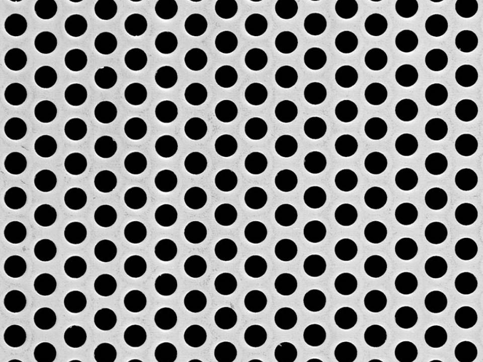 Round hole perforated metal in staggered arrangements