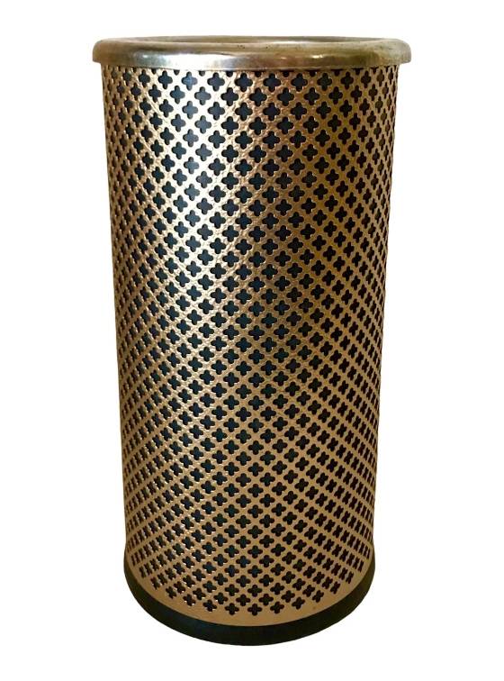 A golden trash can is made of clover perforated metal.
