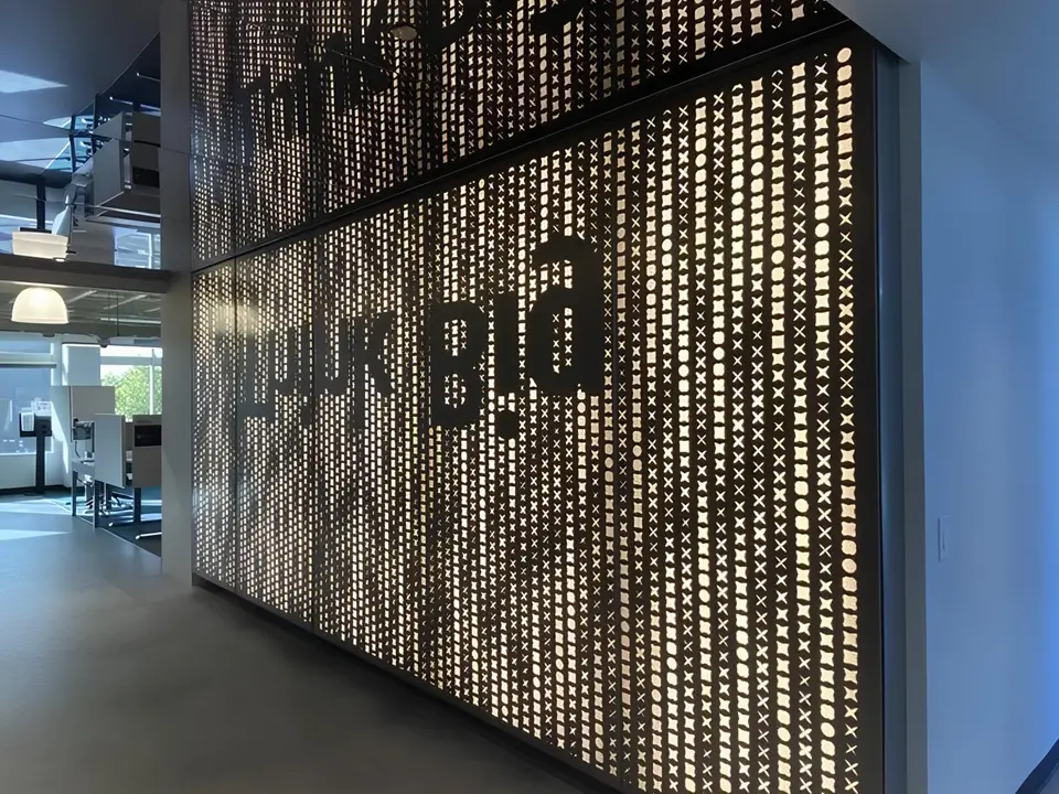 Metal decorative mesh acts as shopping center wall coverings.