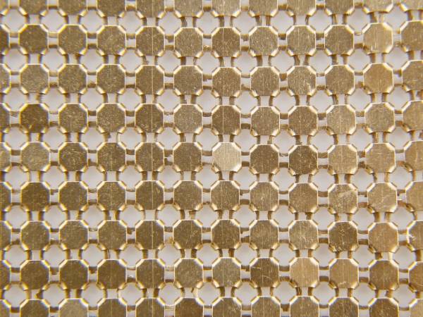 Scale mesh curtain composed of golden round sequins