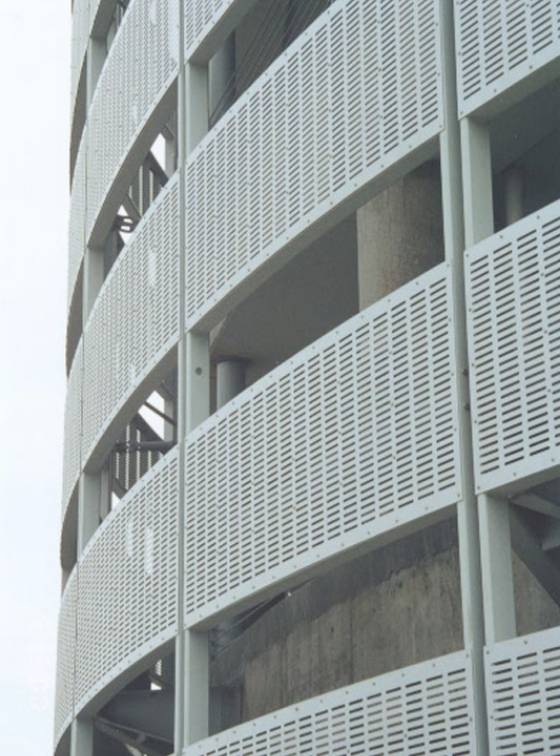 Slotted perforated metal sheets are installed on the building for safety & security purpose.